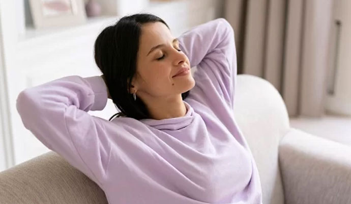 woman sitting on couch